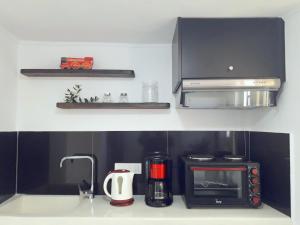 A kitchen or kitchenette at Dioni Holiday House