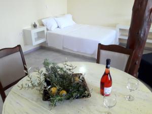 A bed or beds in a room at Dioni Holiday House
