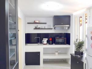 A kitchen or kitchenette at Dioni Holiday House