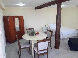 A bed or beds in a room at Dioni Holiday House