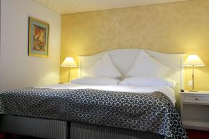 Voodi või voodid majutusasutuse Seilers Vintage Hotel & Spa toas