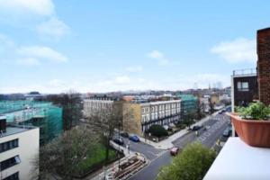 a view of a city street from a building at Stylish 2 Bedroom Apartment Between Camden Town Primrose Hill in London