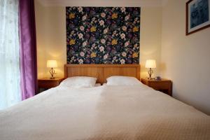 Postel nebo postele na pokoji v ubytování Villa Daphne & Danae by Rujana + 158 fotografií