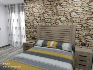 Säng eller sängar i ett rum på Casa Rural Lavernia