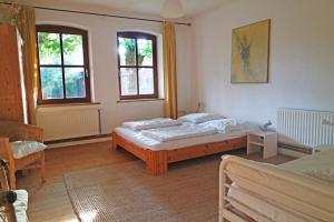 Katil atau katil-katil dalam bilik di Gästehof Brockum, altes Bauernhaus, großer Garten