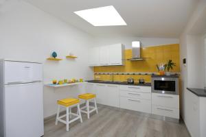 A kitchen or kitchenette at Relais Villa Chiara free parking