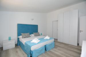A bed or beds in a room at Relais Villa Chiara free parking