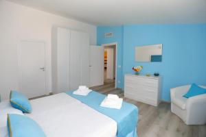 A bed or beds in a room at Relais Villa Chiara free parking