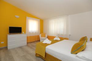 A bed or beds in a room at Relais Villa Chiara free parking