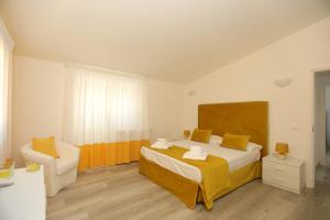 A bed or beds in a room at Relais Villa Chiara free parking