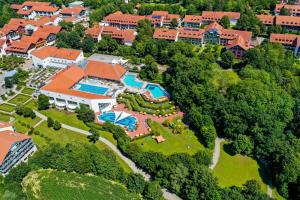 an aerial view of a house with a swimming pool at Ferienhaus Absmeier in Bad Griesbach