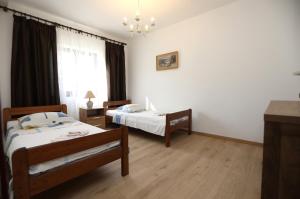 Postel nebo postele na pokoji v ubytování Apartment Sea relief