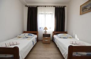 Postel nebo postele na pokoji v ubytování Apartment Sea relief
