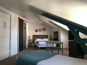 Postel nebo postele na pokoji v ubytování Mosaikhotel