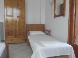 Postel nebo postele na pokoji v ubytování Villa Karapataki