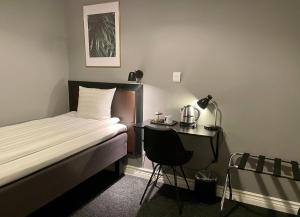Postel nebo postele na pokoji v ubytování Unique Hotel Jungfrugatan