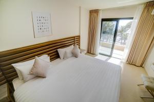 Postel nebo postele na pokoji v ubytování Sea view hotel