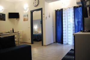 A television and/or entertainment centre at Case Vacanza da Marco&Mary
