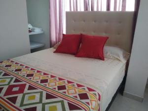 Voodi või voodid majutusasutuse Apartamento oasis del norte toas
