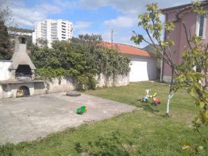 Vonkajšia záhrada v ubytovaní Gecko Apartment