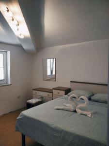 Posteľ alebo postele v izbe v ubytovaní Gecko Apartment