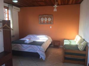 Postel nebo postele na pokoji v ubytování Pousada Mar & Vida e Doçaria