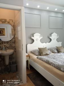 Posteľ alebo postele v izbe v ubytovaní Villa Lucia - Apartments&Rooms