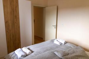 Voodi või voodid majutusasutuse Apartmani Sigma toas