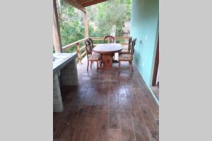 Balkón nebo terasa v ubytování Mazamitla - Cabaña Topacio - El granero + 6 fotografií