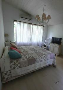Кровать или кровати в номере Muelle Amorcito