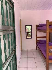 Cama ou camas em um quarto em Villa Paraíso