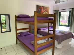 Cama ou camas em um quarto em Villa Paraíso