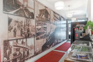 Kuchyň nebo kuchyňský kout v ubytování Queens Hotel