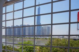 a view from a window of a city skyline at Good For You Hotel in Ho Chi Minh City