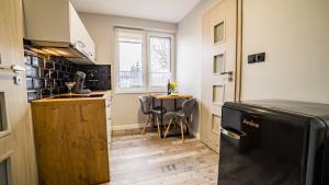 Kuchyňa alebo kuchynka v ubytovaní Apartamenty Silvana