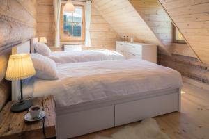Posteľ alebo postele v izbe v ubytovaní Nydala Rustic