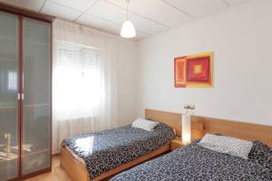 Säng eller sängar i ett rum på Casa entera en el centro de Cantabria