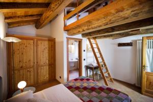 Giường trong phòng chung tại LA PITA