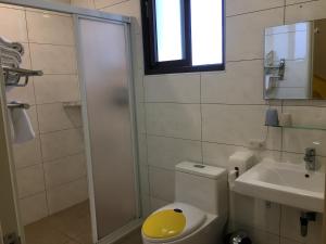 Koupelna v ubytování Ye-Bo Mei Hua Lu