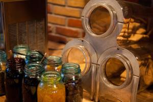 a glass jar filled with lots of different types of jars at Kex Hostel in Reykjavík
