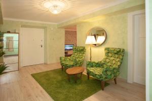 Televízia a/alebo spoločenská miestnosť v ubytovaní Beach apartment Butterfly with sea view