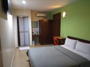 Postel nebo postele na pokoji v ubytování U HOTEL
