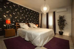 Posteľ alebo postele v izbe v ubytovaní Beach apartment Butterfly with sea view