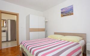 Posteľ alebo postele v izbe v ubytovaní Katja Apartment
