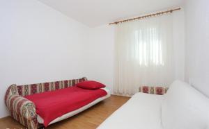 Posteľ alebo postele v izbe v ubytovaní Katja Apartment