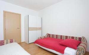 Posteľ alebo postele v izbe v ubytovaní Katja Apartment