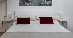 Giường trong phòng chung tại Fiorenzuola Bed & Breakfast