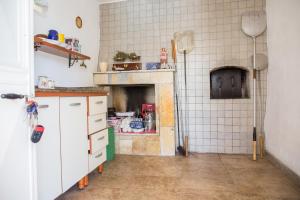A kitchen or kitchenette at Il Trullo di Heidi