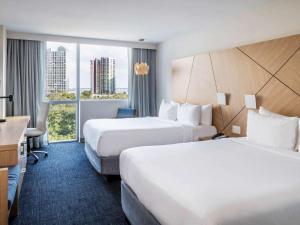 Cama ou camas em um quarto em Novotel Miami Brickell