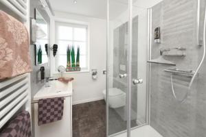 Koupelna v ubytování Hotel zur Post + 37 fotografií